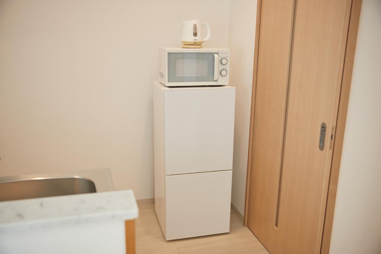 New Normal Hotel In Nago ニューノーマルホテルイン名護 Esterno foto